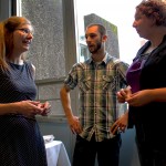 Graduates students discussing with speaker