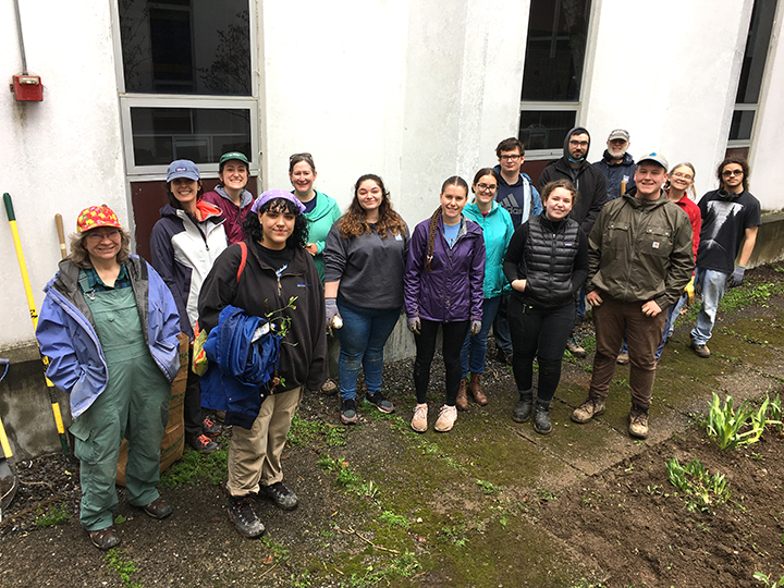 Ann Dieffenbacher-Krall and student volunteers in Murray Hall courtyard on Maine Day