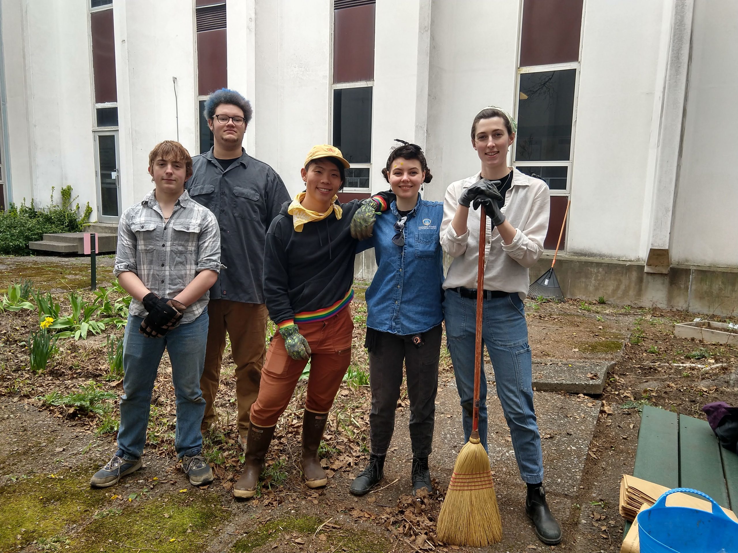 Chris Nelson, Fischer Powell, Jay Kim, Brenda Jones, and Kit Carpenter working in the Murray Hall courtyard for Maine Day